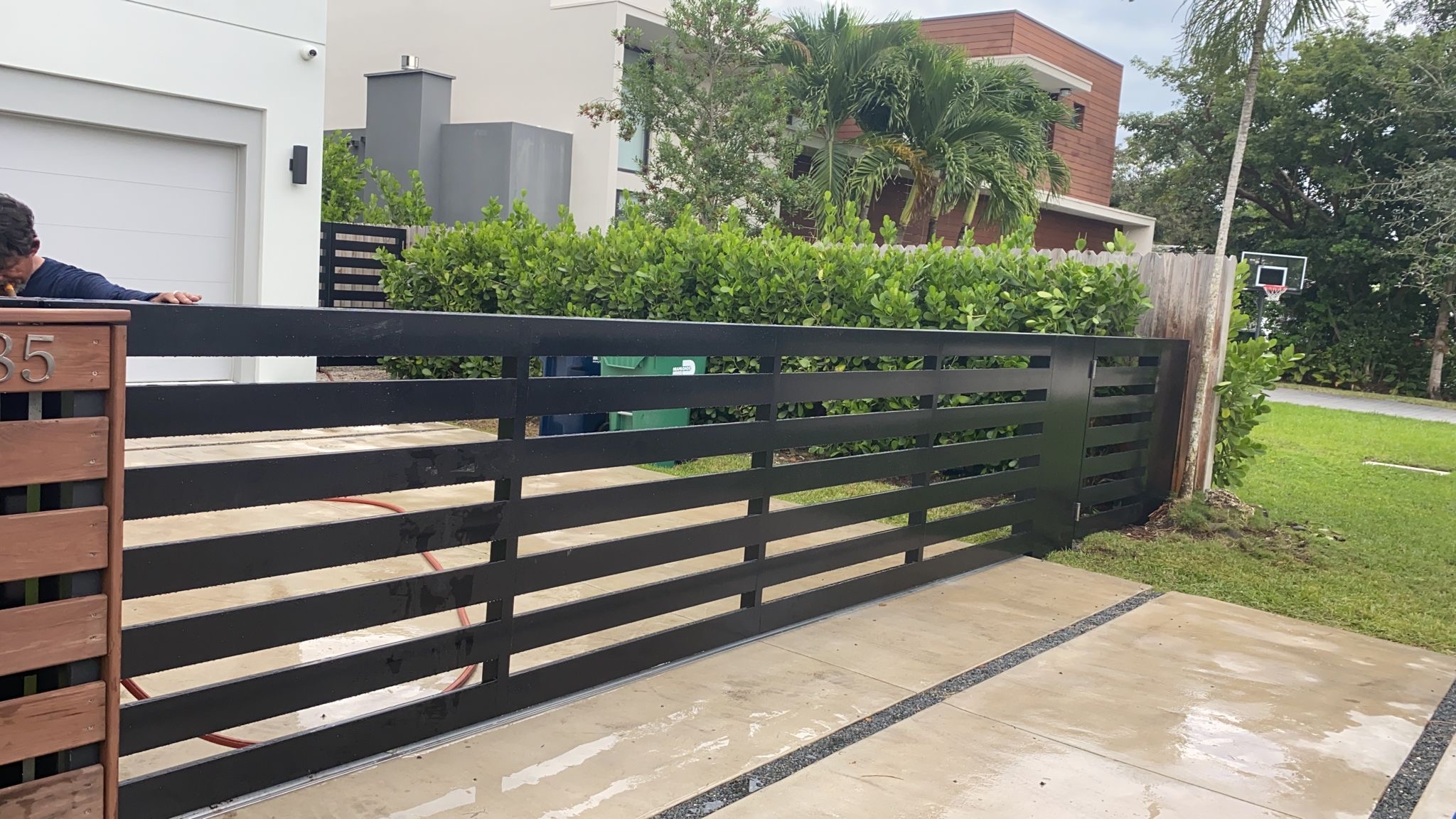Contemporary Horizontal Slat Sliding Gate