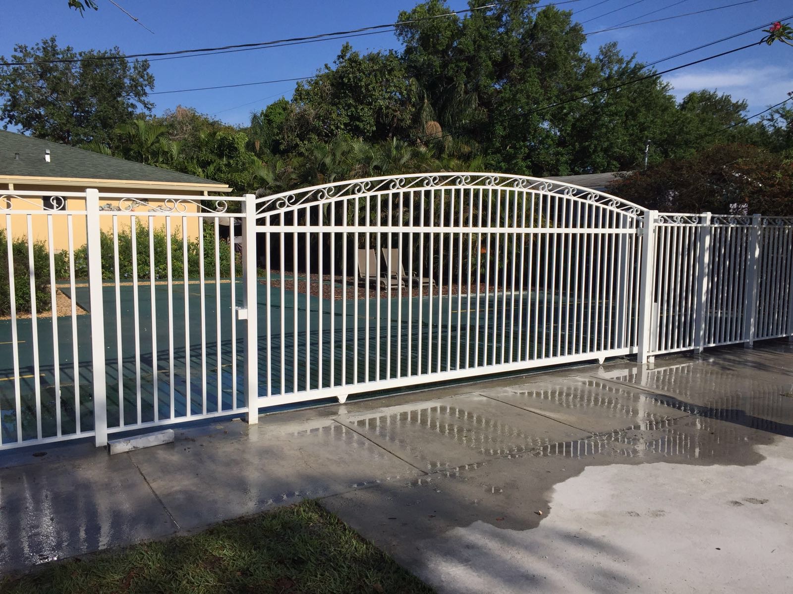 White Arched Ornamental Driveway Gate