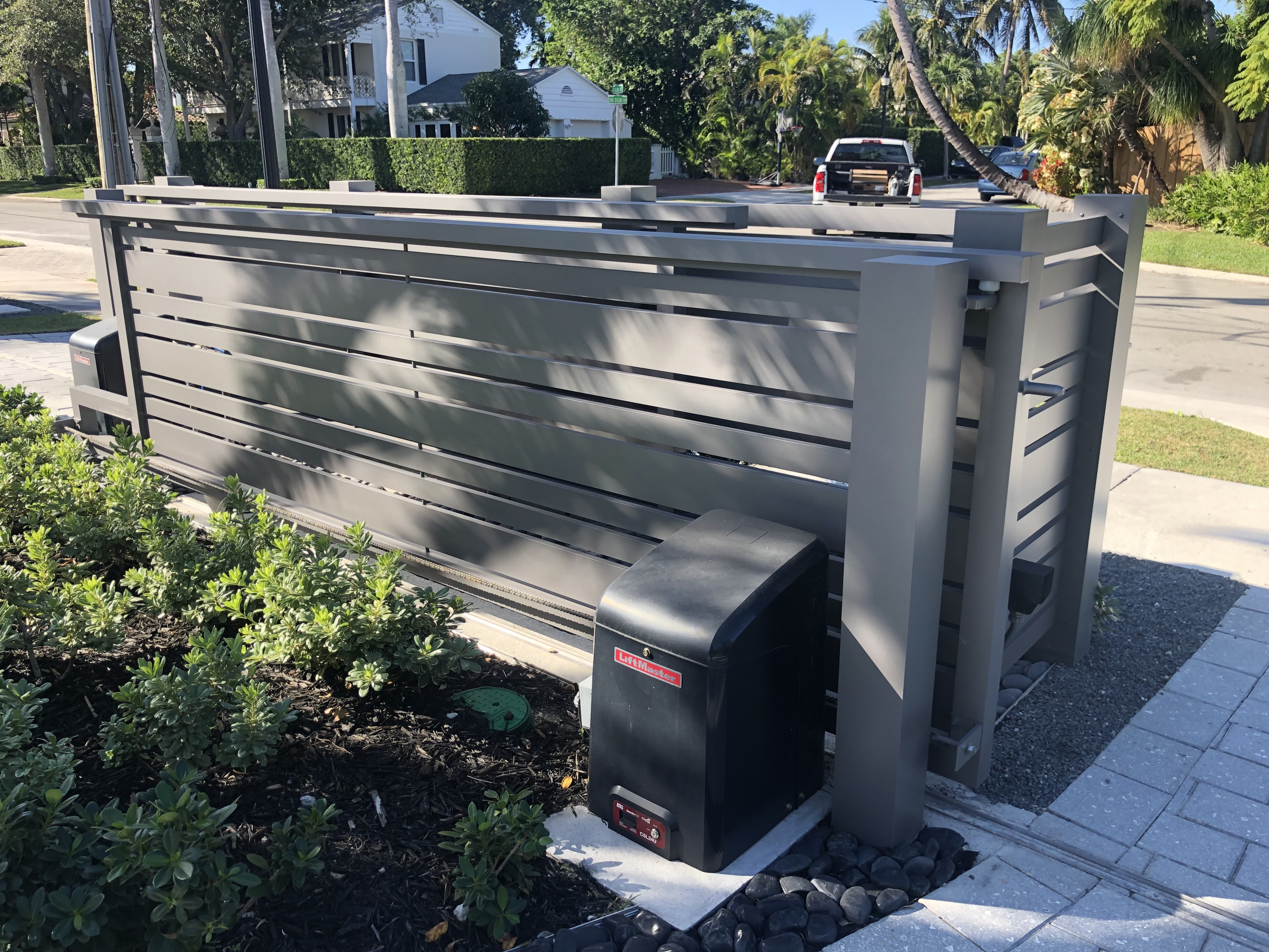 Gray Aluminum Sliding Gate with Motor Enclosure