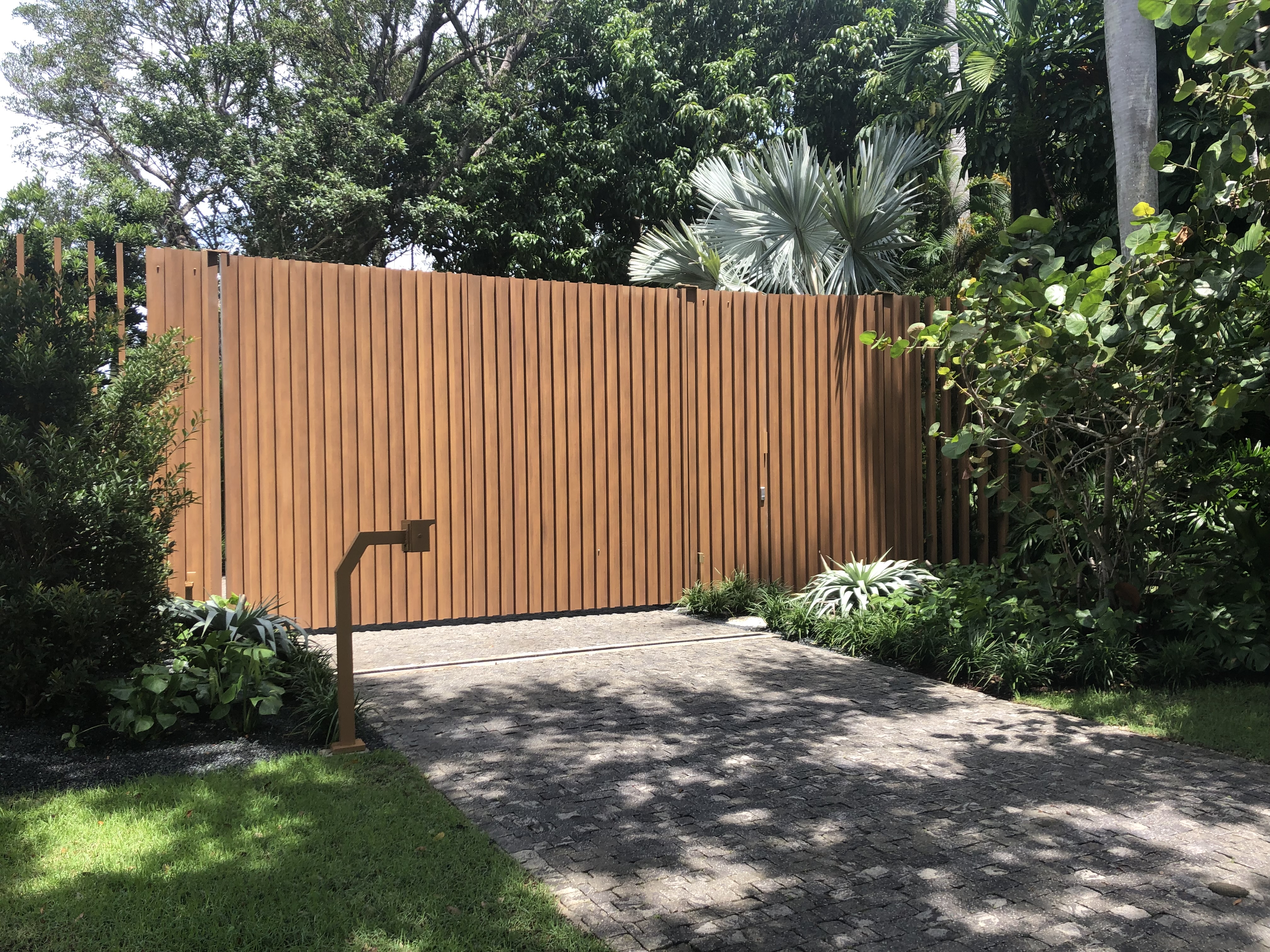 Wood-Tone Vertical Privacy Swing Gate