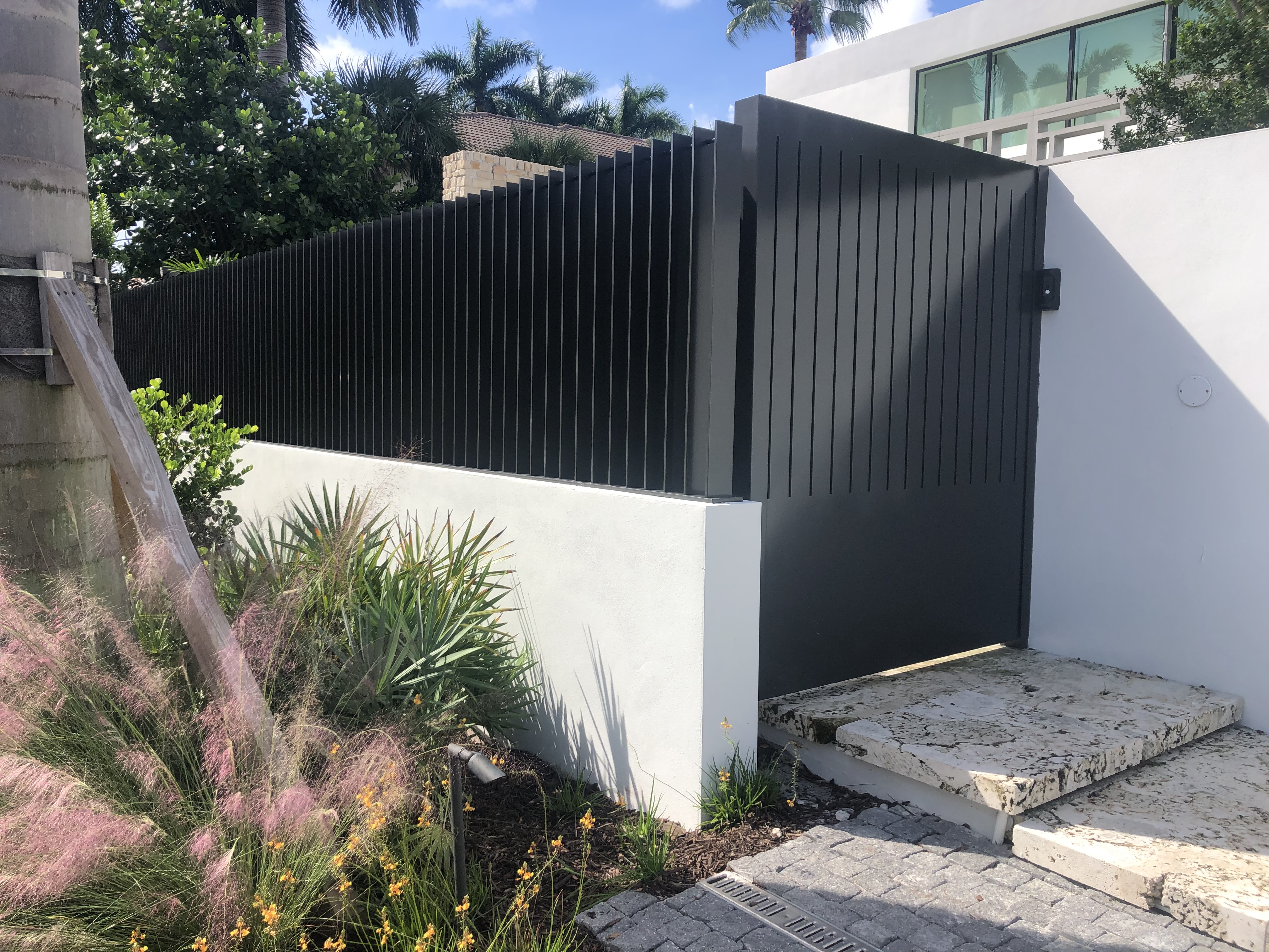 Black Vertical Picket Fence with Pedestrian Gate