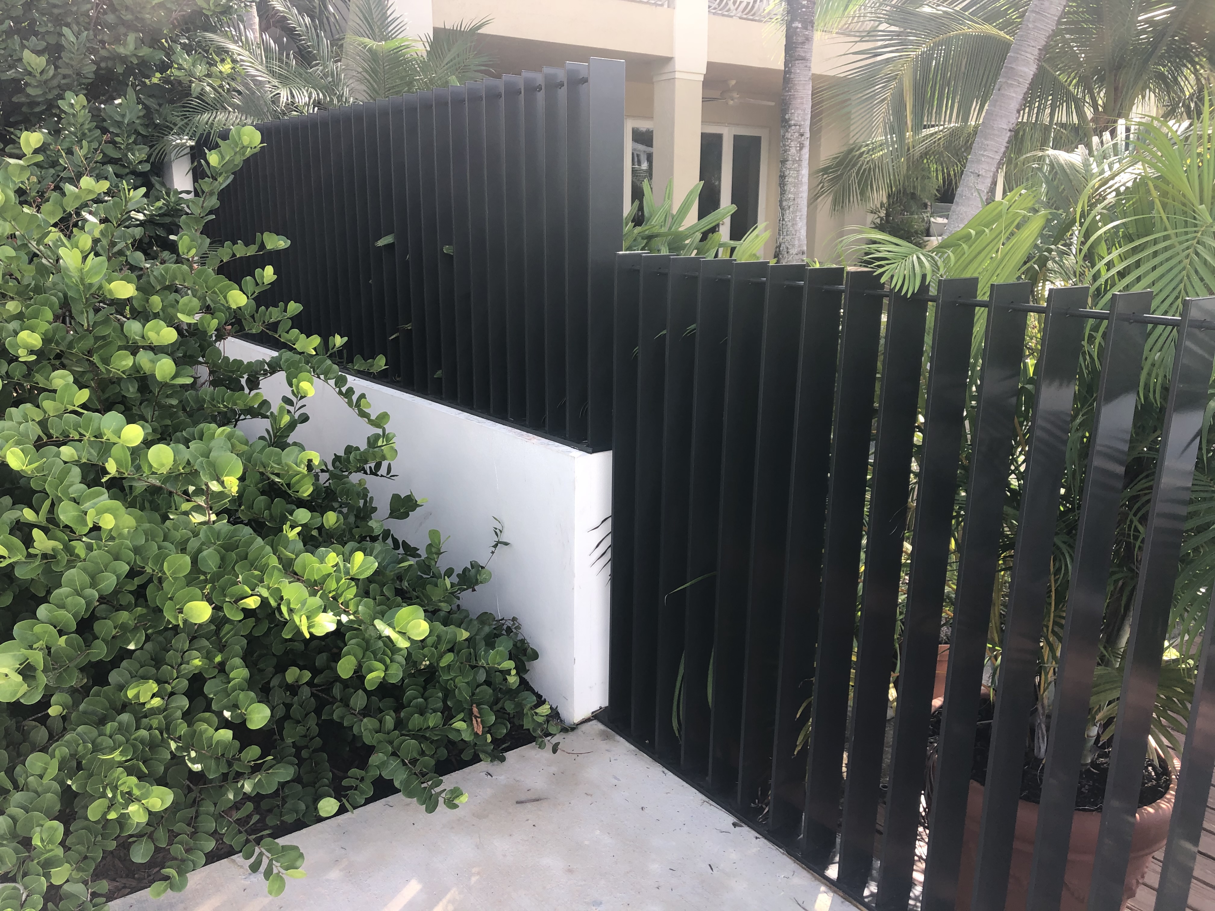 Black Vertical Slat Privacy Fence Corner Detail