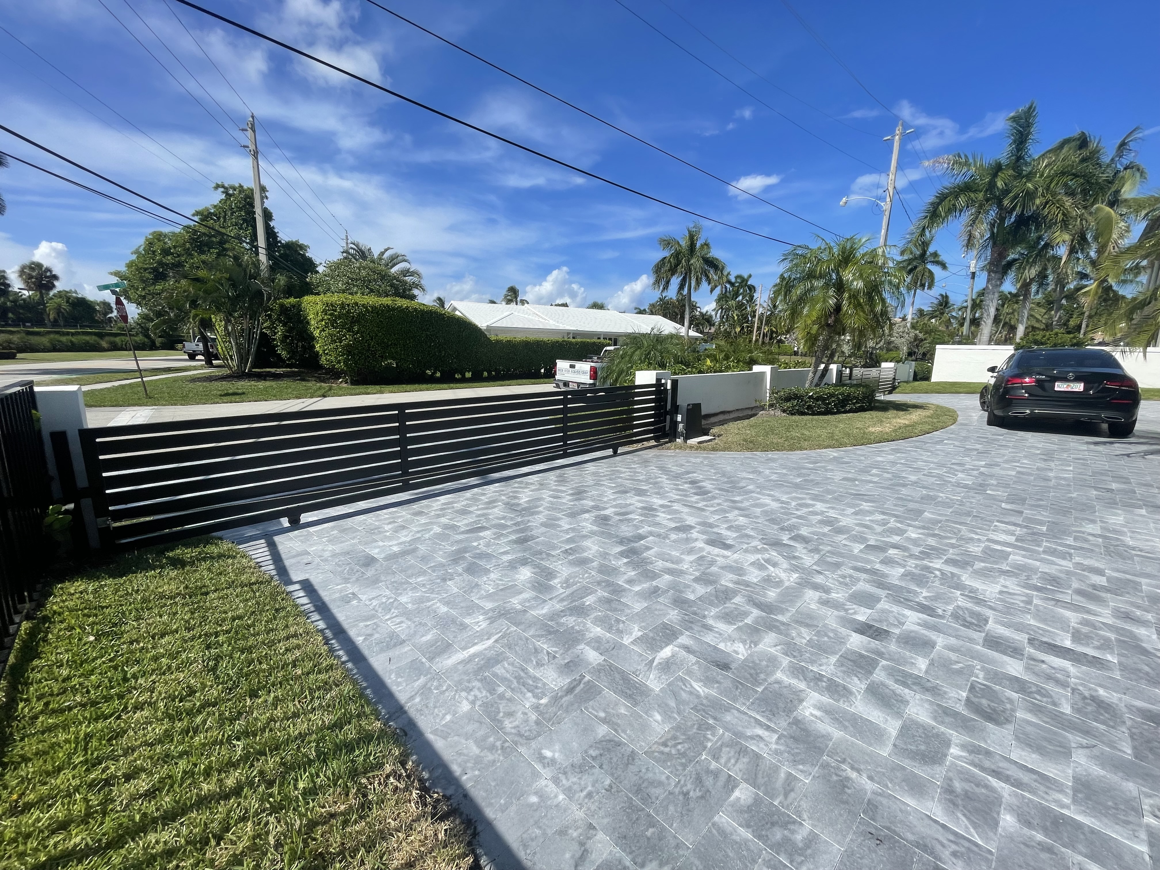 Black Horizontal Slat Motorized Sliding Gate