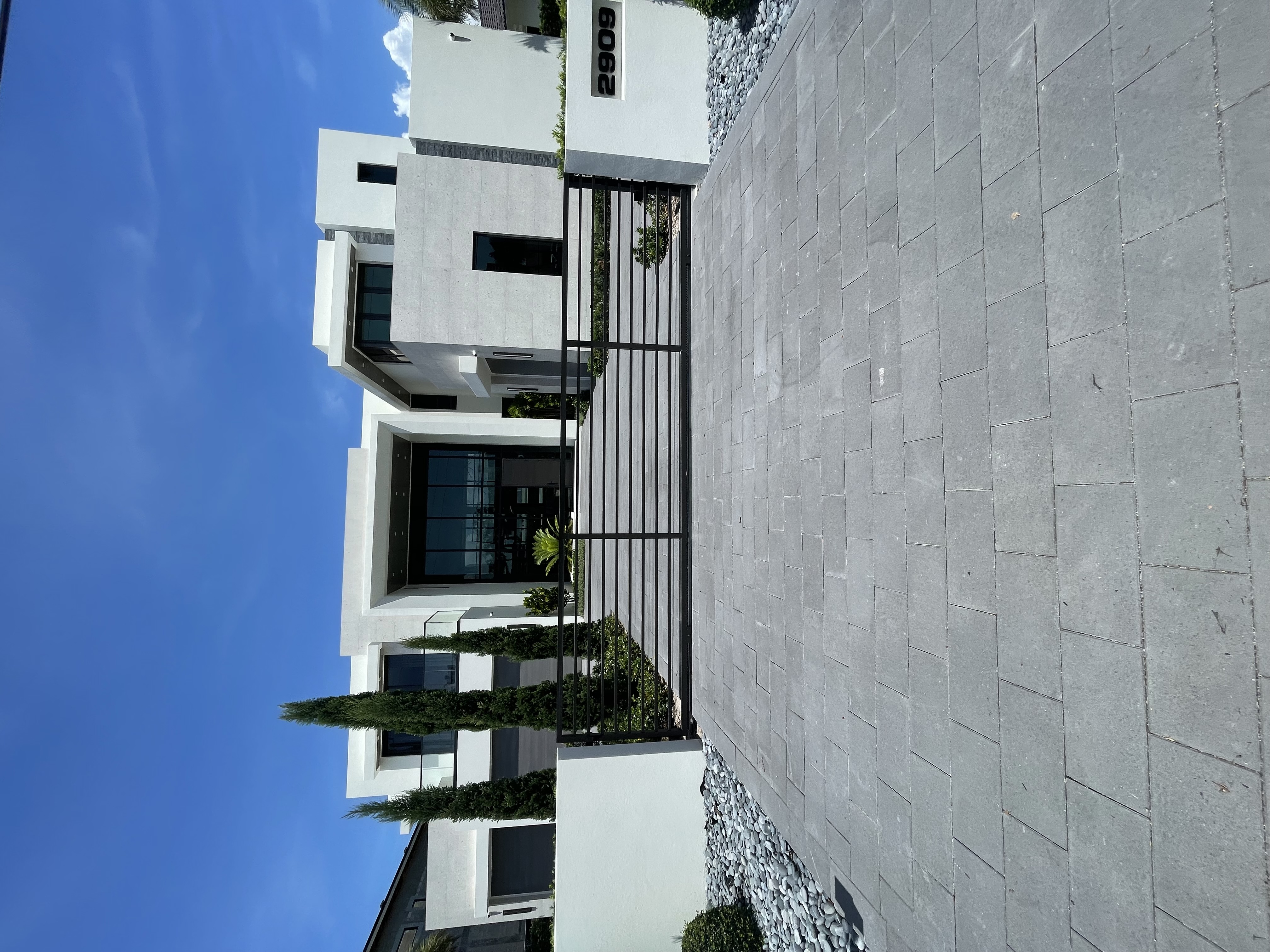 Modern Vertical Picket Fence at Contemporary Home