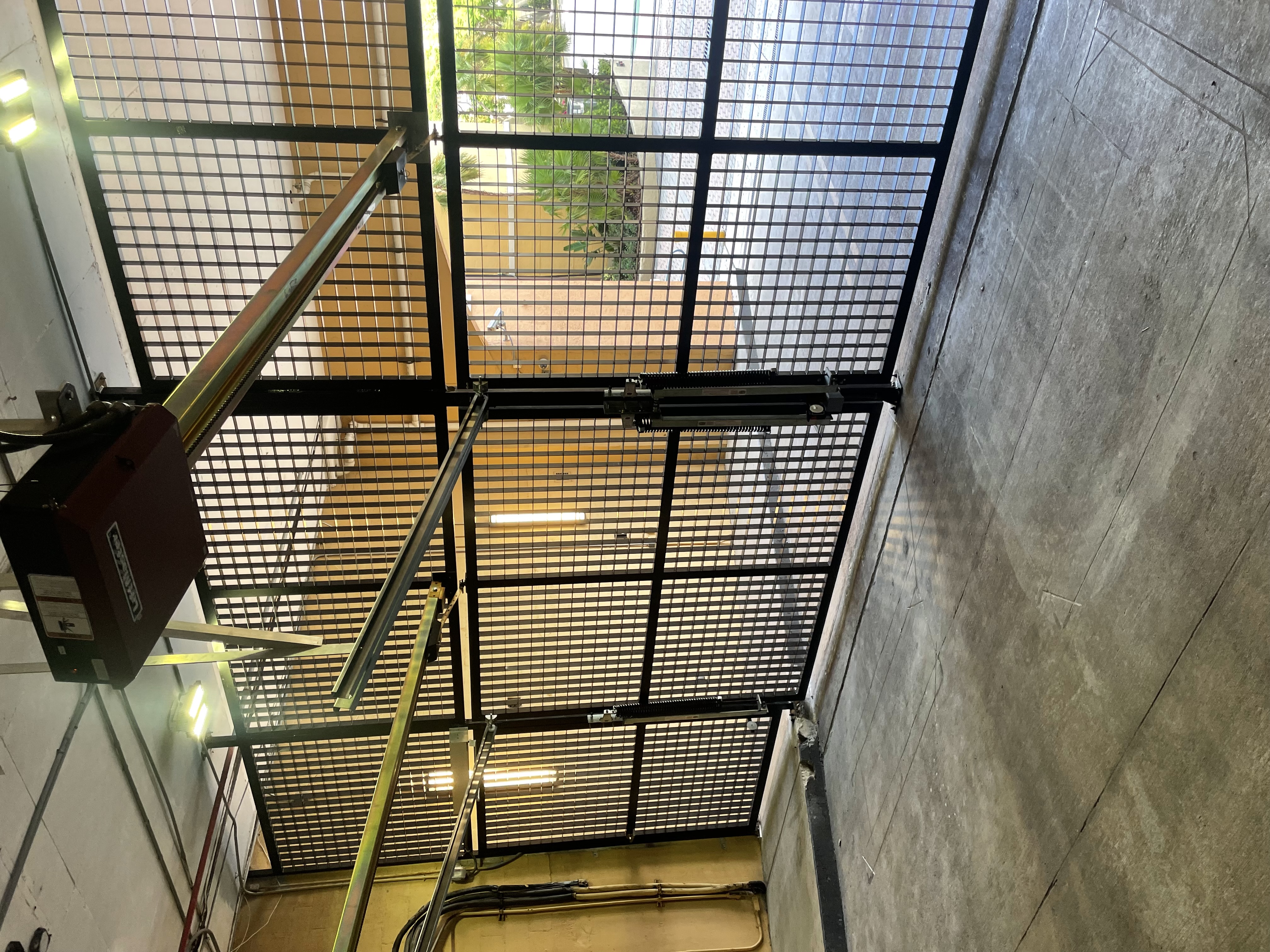 Overhead Mesh Security Gate with Automatic Opener