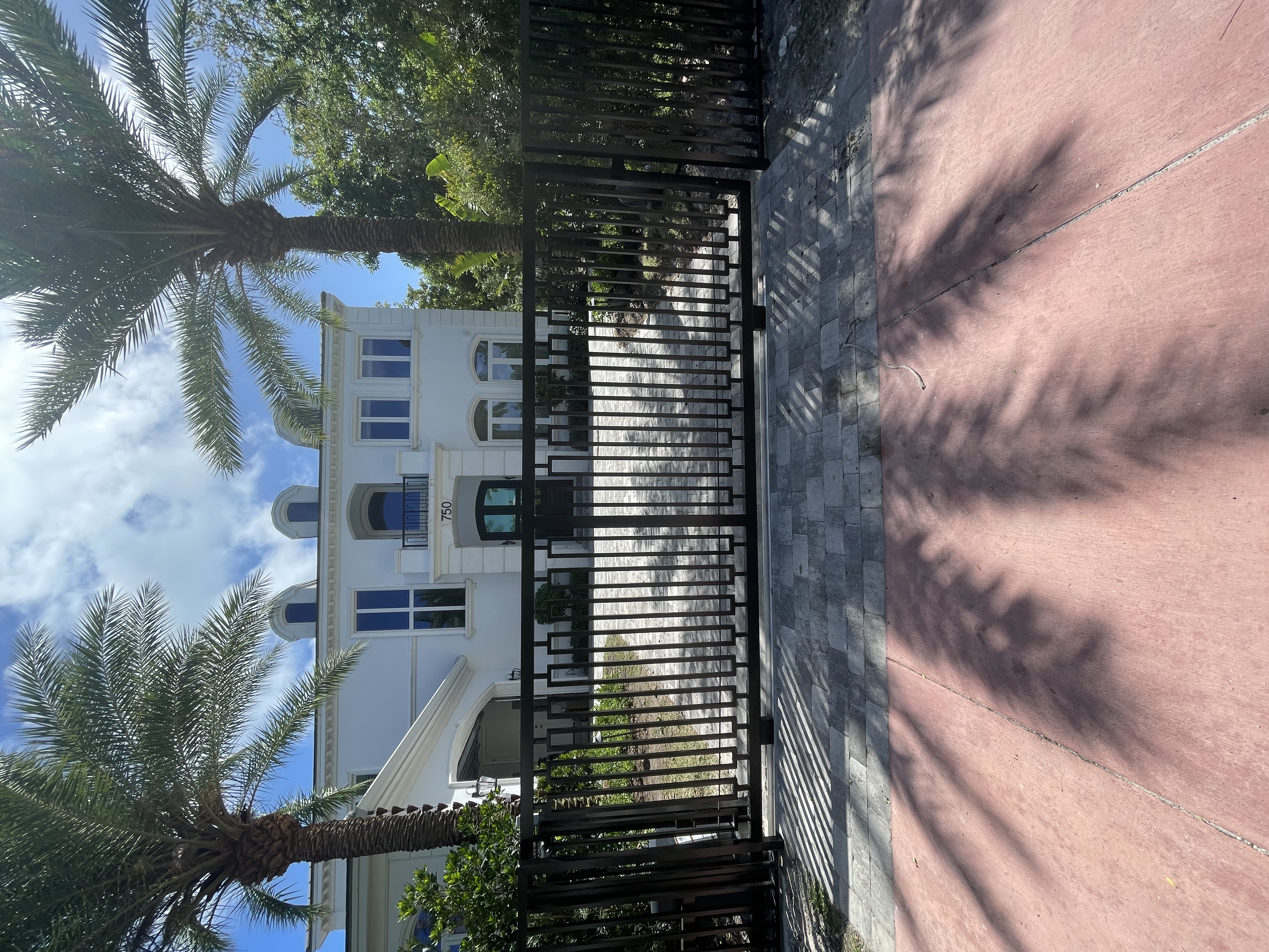 Horizontal Aluminum Driveway Gate with Brick Paving