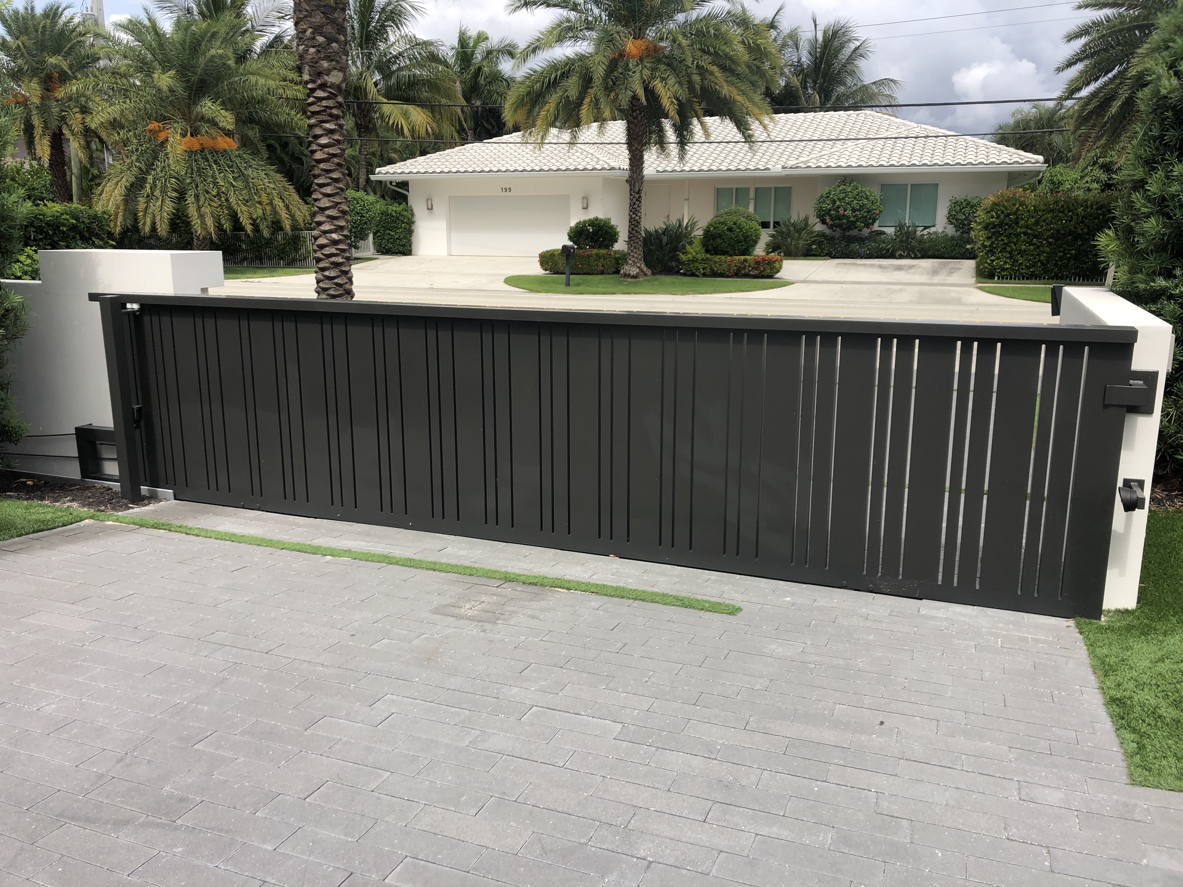 Black Vertical Slat Sliding Gate with Intercom