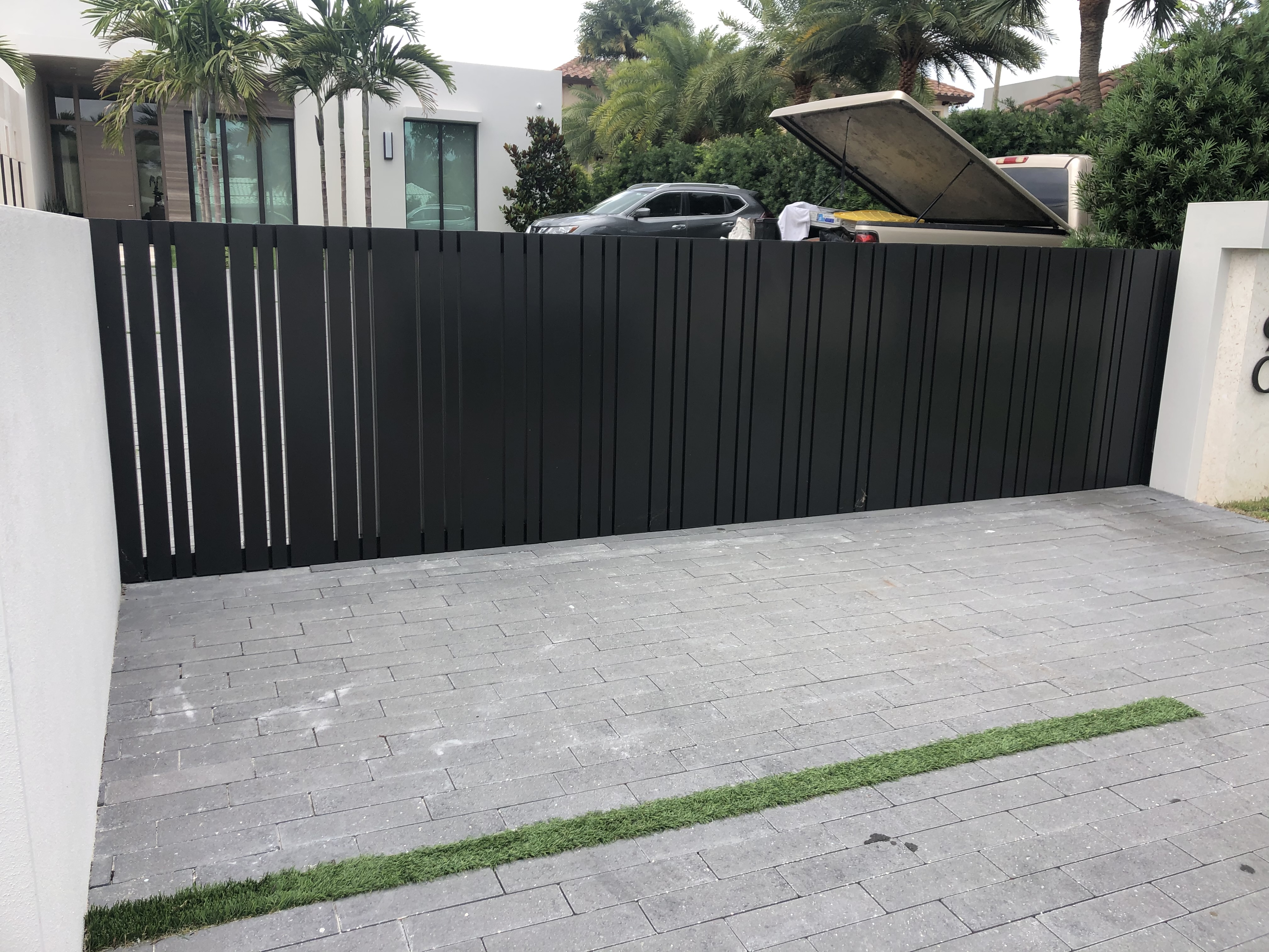 Black Vertical Slat Privacy Sliding Gate